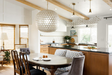 Example of a mid-sized transitional light wood floor, beige floor and exposed beam great room design in San Diego