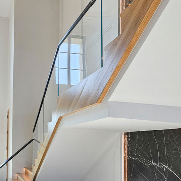 Project #107 | Freestanding Staircase with Marble Backdrop