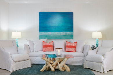 Large beach style formal and open concept porcelain tile and brown floor living room photo in Miami with white walls, no fireplace and no tv