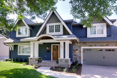 Inspiration for a craftsman green one-story vinyl exterior home remodel in Philadelphia