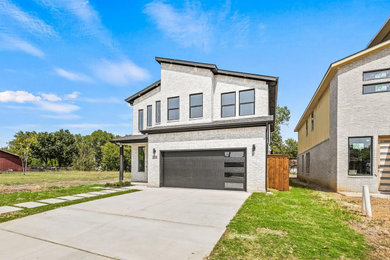 Mid-sized minimalist home design photo in Dallas
