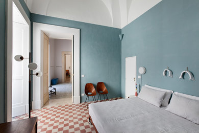 Photo of a mediterranean master bedroom in Milan.