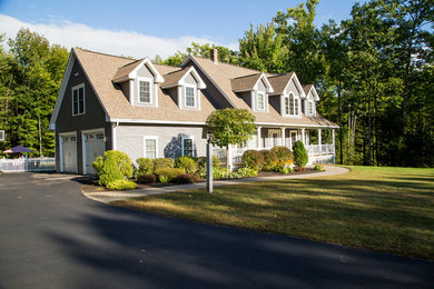 Gray three-story exterior home idea in Portland Maine