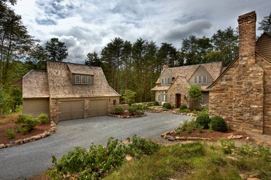 Transitional two-story mixed siding gable roof photo in Other