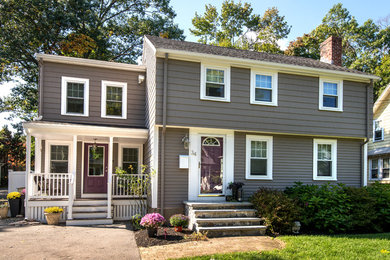 Large modern gray two-story vinyl exterior home idea in Boston with a shingle roof