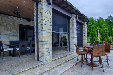 Patio - contemporary patio idea in Other