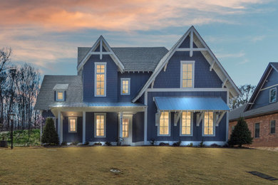 Example of a cottage blue exterior home design in Other