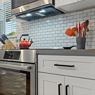 Laguna Niguel Compact Chef’s Corner with Quartz Surfaces and Bold Kitchen Accent