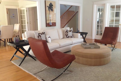 Example of a mid-sized transitional formal light wood floor living room design in San Francisco with white walls, a standard fireplace, a stone fireplace and no tv