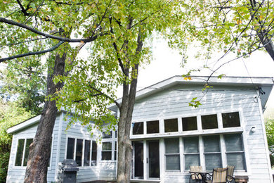 Large blue split-level gable roof idea in DC Metro