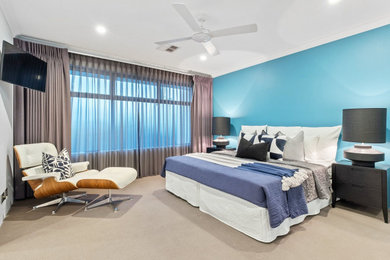 Photo of a beach style bedroom in Perth.