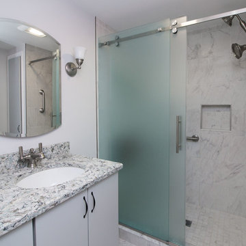 Contemporary Churchill Paint finish Bath Remodel w/frameless frosted slidingdoor