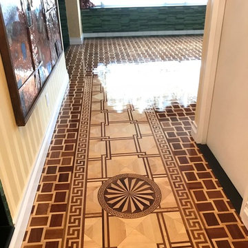Decorative border frames the flooring much like a picture frame