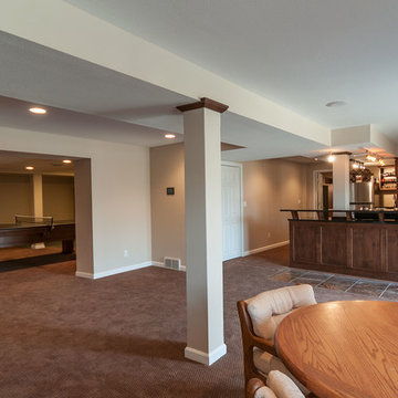 Expanding to stay: Basement game room and kitchen