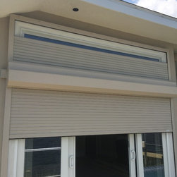 Motorized Rolling Hurricane Shutters- Mulheron Home - Products