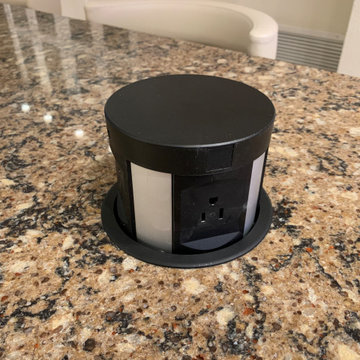Electrical pop up keeps cords off of counter tops