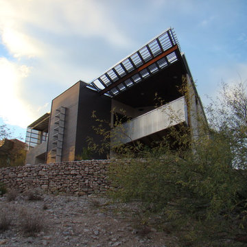 hillside perch made possible with cut/fill strategy, gabion wall and backfill