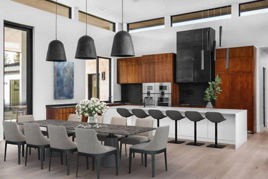 Eat-in kitchen - modern l-shaped eat-in kitchen idea with dark wood cabinets and an island