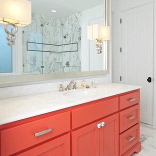 Inspiration for a mediterranean bathroom in Dallas with orange cabinets, granite worktops, white tiles and stone tiles.