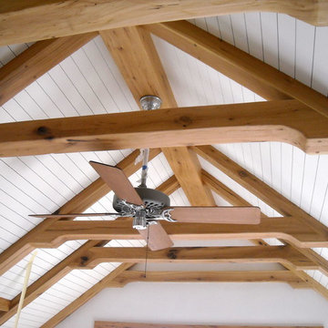 Warm Honey-Blonde Timber Trusses in a Vaulted Cathedral Ceiling