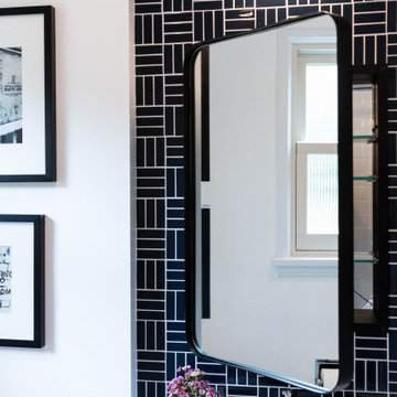 Classic and Fresh Bathroom with an exciting Navy Tile Wall