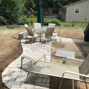 Concrete patio paver surround