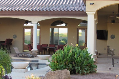 Large tuscan beige one-story exterior home photo in Phoenix