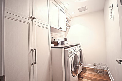 Inspiration for a contemporary laundry room remodel in Montreal