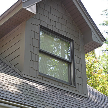Staggered shake dormer siding