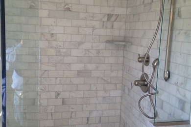 Example of a transitional bathroom design in Other
