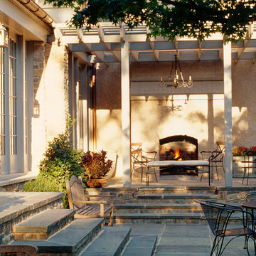 French Country Terrace & Pergola with outside Fireplace
