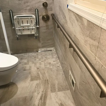 Non Skid floor, Linear Drain, extended grab bar/handrail