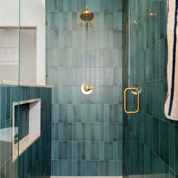 Teal shower, brass fixtures — 90s Fixer, Reno interior design by Find Design