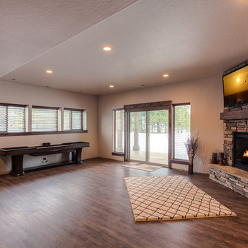 Family room with fireplace, TV, and activity table