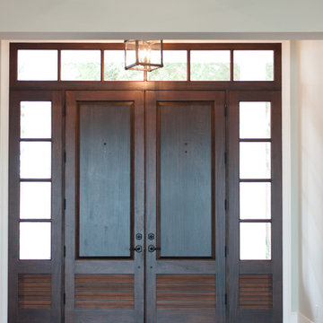 Coastal inspired estate sited on over one acre on Lake Butler in Windermere