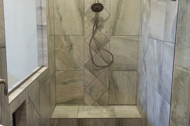 Mid-sized trendy multicolored tile and porcelain tile porcelain tile double shower photo in Seattle with black cabinets, quartzite countertops, a two-piece toilet and yellow walls