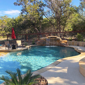 Freeform with Grotto, Beach Entry, and Flagstone Sun Shelf