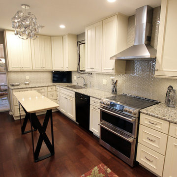 Medallion Painted White Chocolate Kitchen Cabinets with Petal Mosaic Backsplash