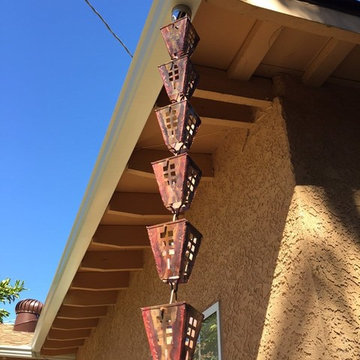 Copper Cups Rain Chain on Stucco House