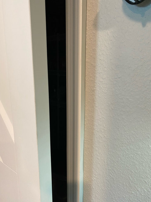 How would I fill this barn door gap?