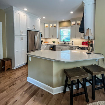 White Kitchen with Black Range Hood and Taj Royale quartz Countertops