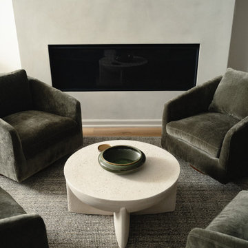 Lower-Level Sitting Area with Linear Gas Fireplace