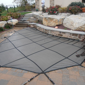 North Whitehall custom pool with boulder waterfall, slide, & separate spa
