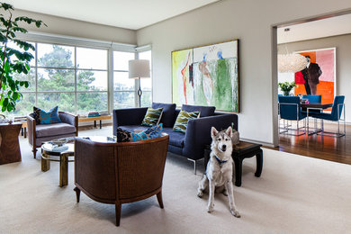 This is an example of a contemporary living room in San Francisco with grey walls.