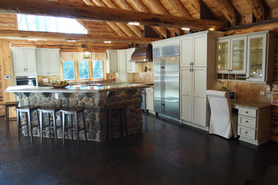 Open concept kitchen - large rustic l-shaped slate floor open concept kitchen idea in Philadelphia with a farmhouse sink, recessed-panel cabinets and an island