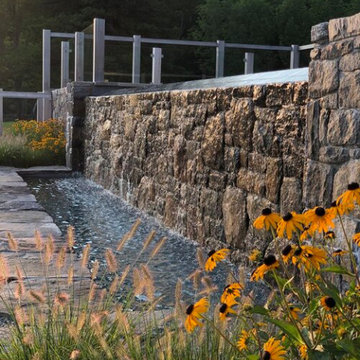 vanishing edge spa + granite decking
