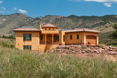 Mediterranean two-story exterior home idea in Denver