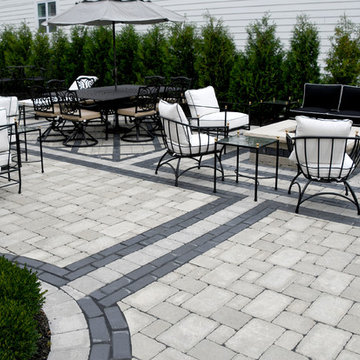 modern brick paver back yard patio