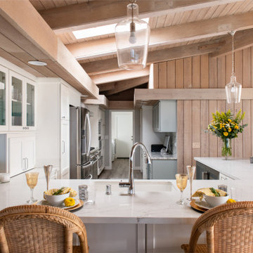 Quartz Countertop Over Large Kitchen Peninsula with Bar Seating