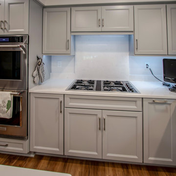 Custom Two Tone Gray Kosher Kitchen with Quartz Countertops